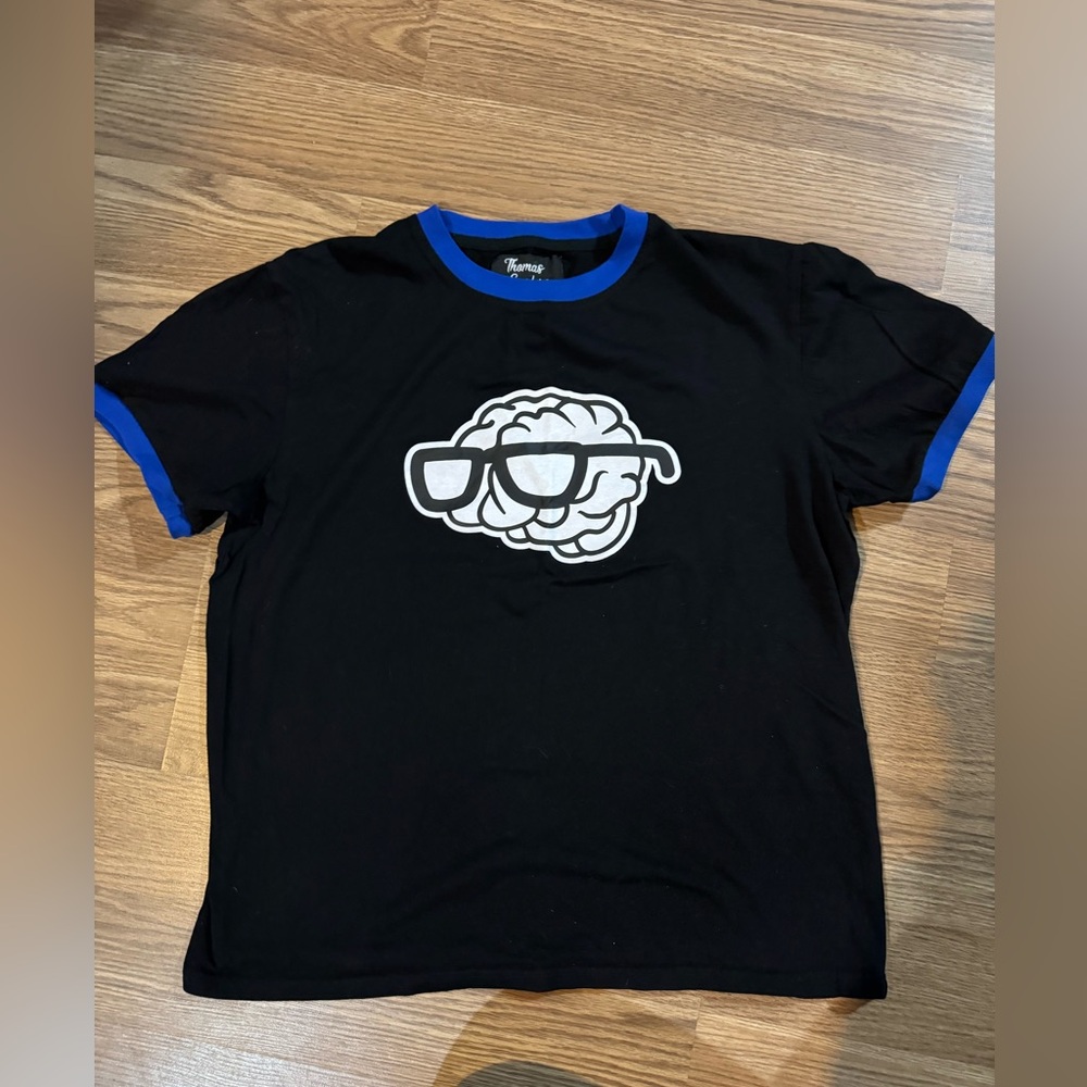 Thomas Sanders Sides Patton Morality T-Shirt in black with blue ringer.
